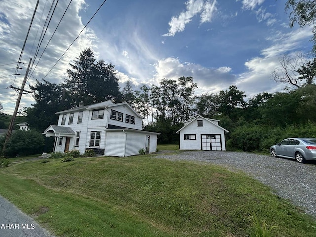 325 Mcfarland Rd, Tyrone, PA 16686 - view of front of property featuring an outbuilding, a front yard, and a detached garage