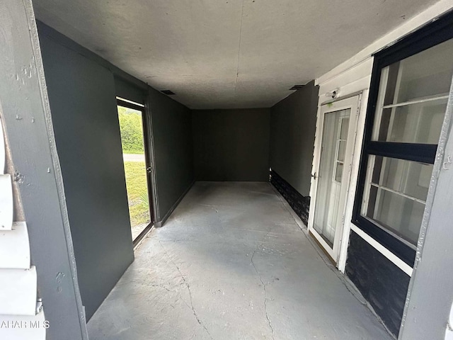 325 Mcfarland Rd, Tyrone, PA 16686 - hallway featuring unfinished concrete floors