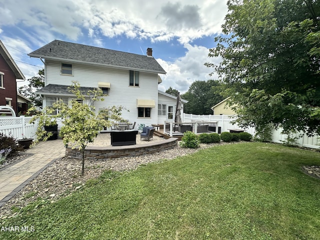705 Clark St, Hollidaysburg, PA 16648 - rear view of property with a chimney, a fenced backyard, a patio area, and a deck