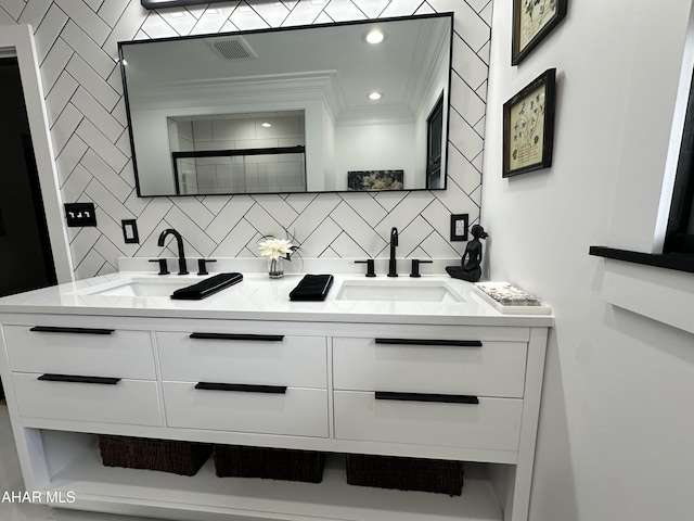 705 Clark St, Hollidaysburg, PA 16648 - bathroom featuring double vanity, backsplash, and recessed lighting
