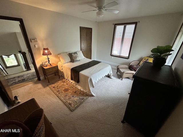 705 Clark St, Hollidaysburg, PA 16648 - carpeted bedroom featuring multiple windows and a ceiling fan