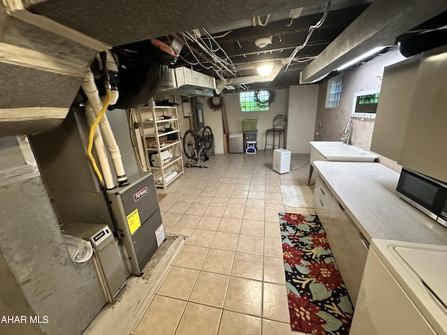 705 Clark St, Hollidaysburg, PA 16648 - basement featuring light tile patterned floors and a sink