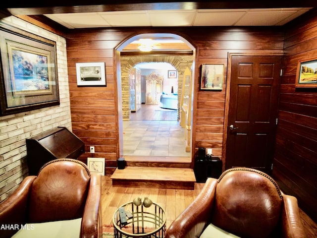 9510 Lincoln Hwy, Bedford, PA 15522 - living area featuring arched walkways and wooden walls