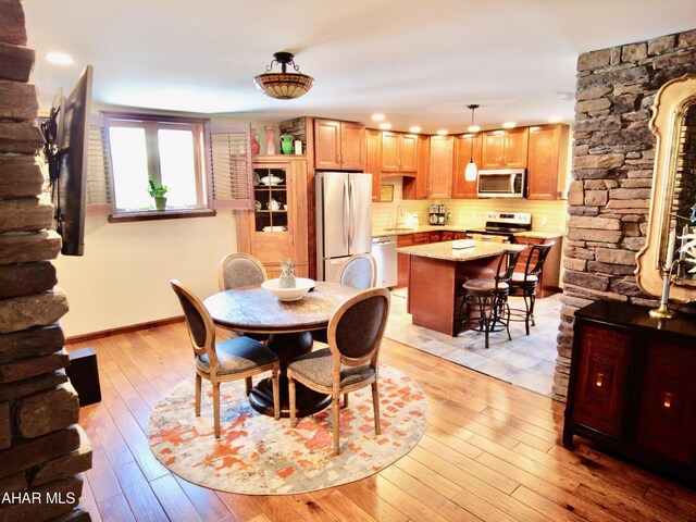 9510 Lincoln Hwy, Bedford, PA 15522 - dining room featuring light wood-type flooring and recessed lighting