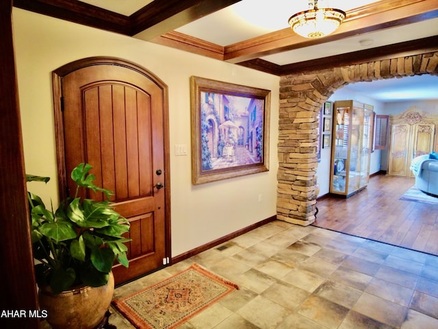9510 Lincoln Hwy, Bedford, PA 15522 - foyer featuring arched walkways, beam ceiling, and ornamental molding