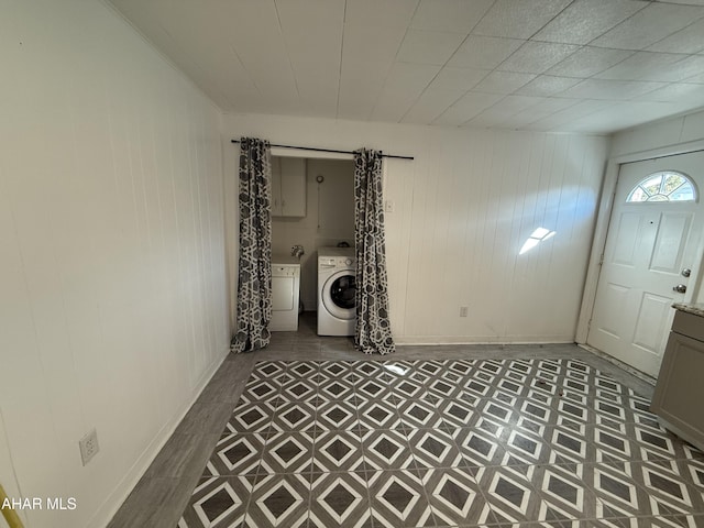 interior space featuring washer and clothes dryer