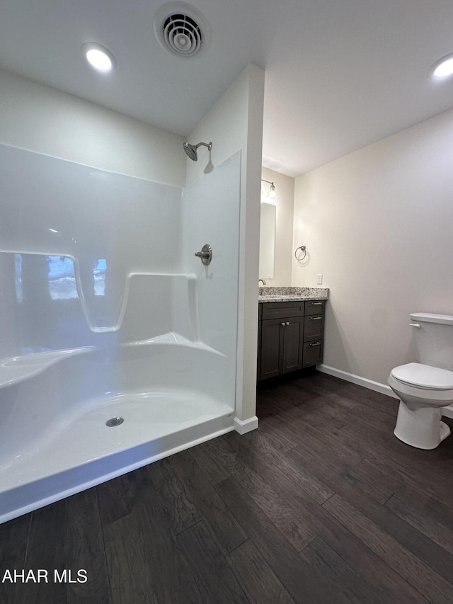 111 Red Tail Cir, Duncansville, PA 16635 - bathroom with visible vents, toilet, wood finished floors, walk in shower, and vanity