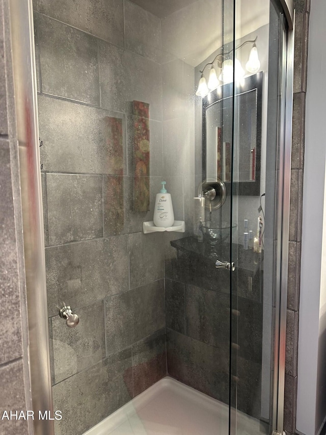 bathroom featuring an enclosed shower