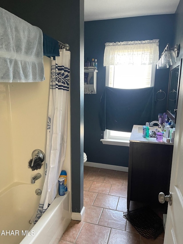 bathroom featuring toilet and shower / tub combo with curtain