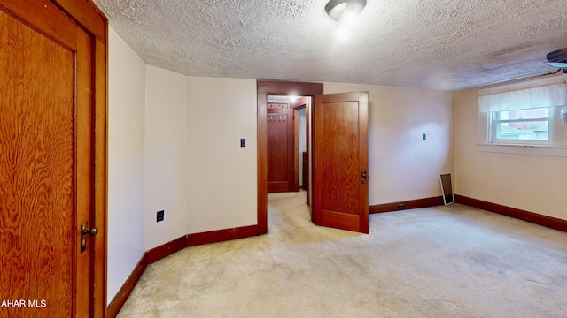 interior space featuring a textured ceiling