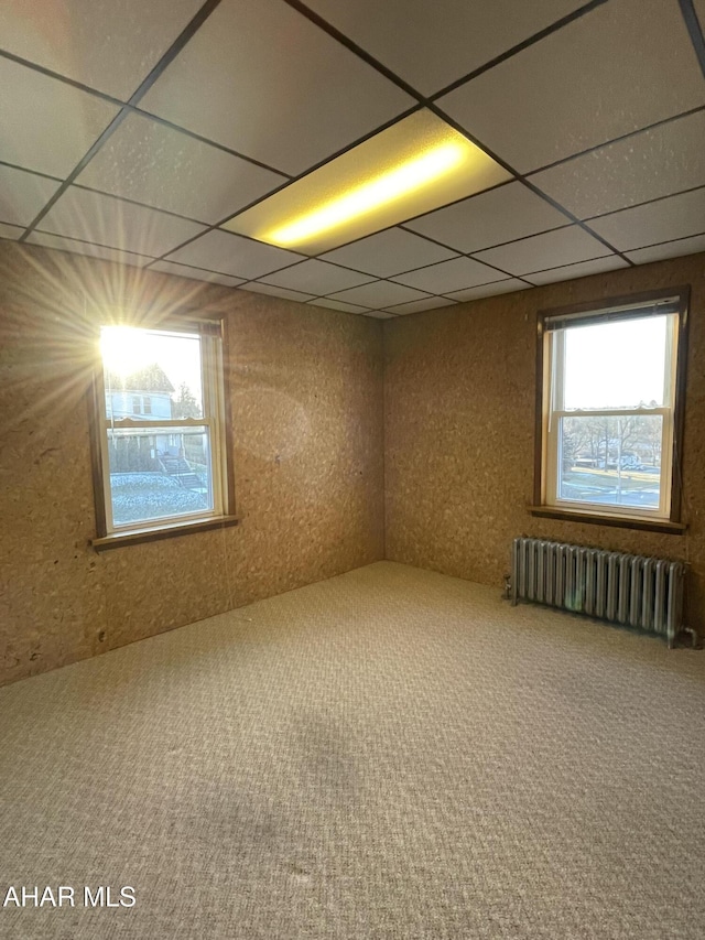 unfurnished room with radiator