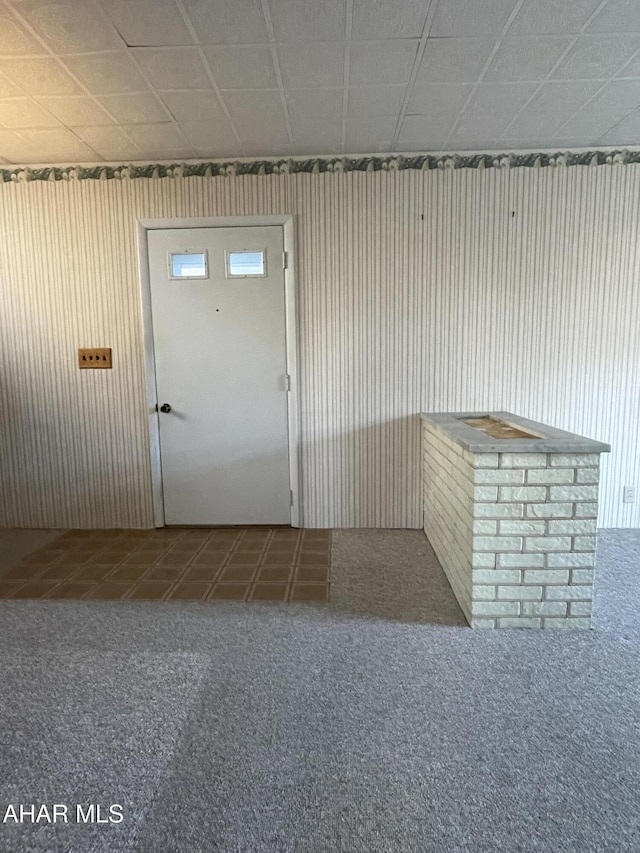 view of carpeted entrance foyer