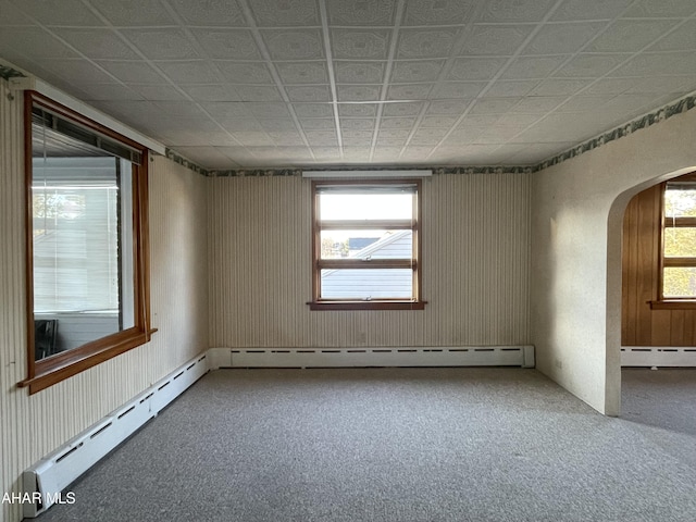 spare room featuring a baseboard radiator