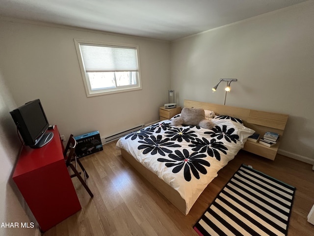 143 E Valley Point Ln, Claysburg, PA 16625 - bedroom featuring hardwood / wood-style floors and a baseboard radiator