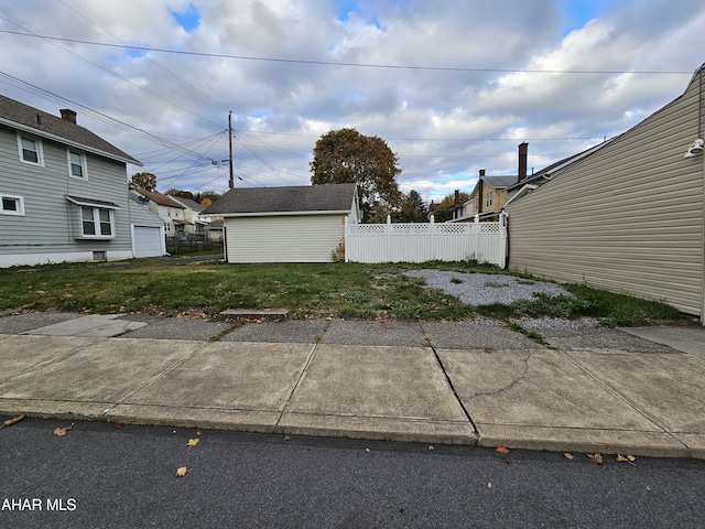 view of property exterior featuring a yard