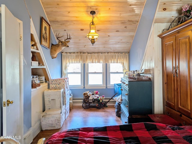 bedroom with hardwood / wood-style flooring, lofted ceiling, a baseboard heating unit, and wooden ceiling