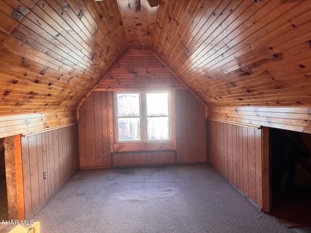 bonus room featuring light carpet, wooden ceiling, wood walls, and lofted ceiling