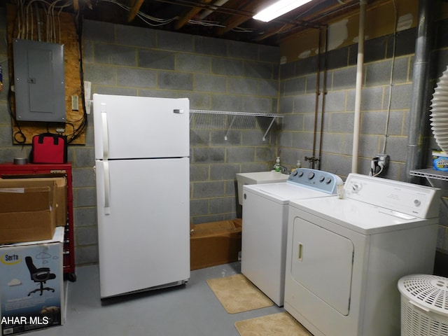 washroom with electric panel and independent washer and dryer