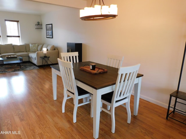 dining area with light wood-type flooring