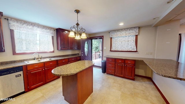 602 5th Ave, Altoona, PA 16602 - kitchen featuring stainless steel dishwasher, a sink, dark brown cabinets, decorative light fixtures, and a center island