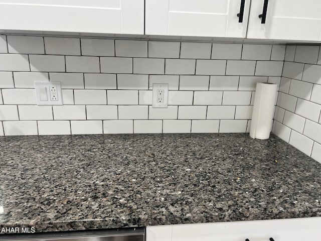 2306 5th Ave, Altoona, PA 16602 - kitchen view of white cabinets, backsplash, and dark stone counters