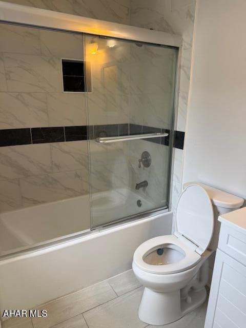 2306 5th Ave, Altoona, PA 16602 - full bathroom featuring toilet, combined bath / shower with glass door, and vanity