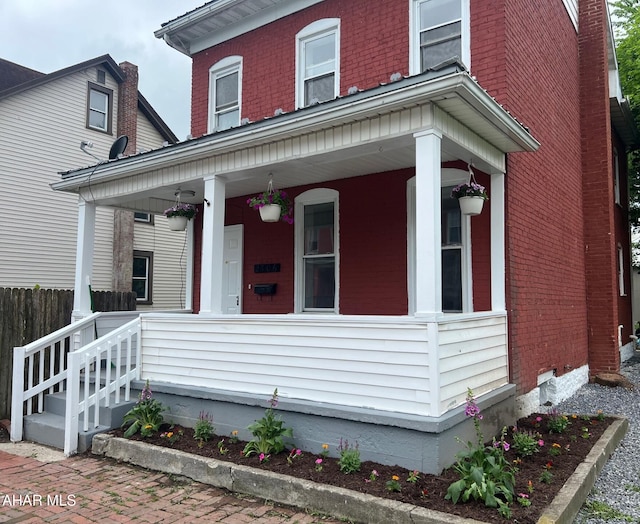 2306 5th Ave, Altoona, PA 16602 - view of front of house featuring covered porch and brick siding