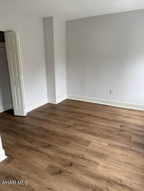 2306 5th Ave, Altoona, PA 16602 - unfurnished room featuring wood finished floors and baseboards