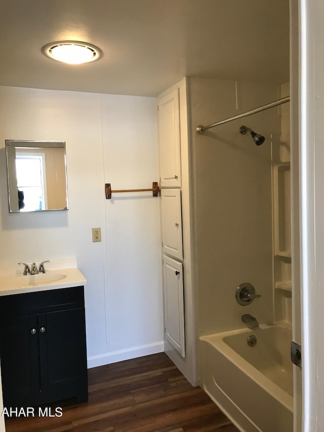 2754 Everett Rd, East Freedom, PA 16637 - full bathroom with vanity, bathing tub / shower combination, and wood finished floors