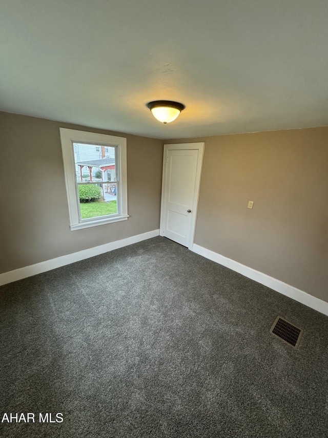 435 Baynton Ave, Altoona, PA 16602 - empty room featuring baseboards and dark colored carpet