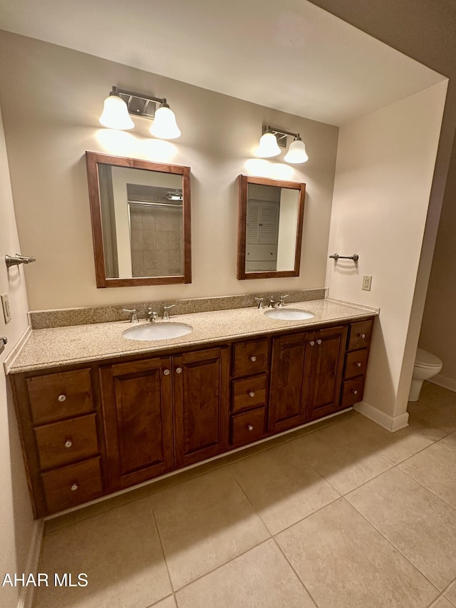 3405 Crescent Rd, Altoona, PA 16602 - full bathroom with double vanity, tile patterned flooring, and toilet