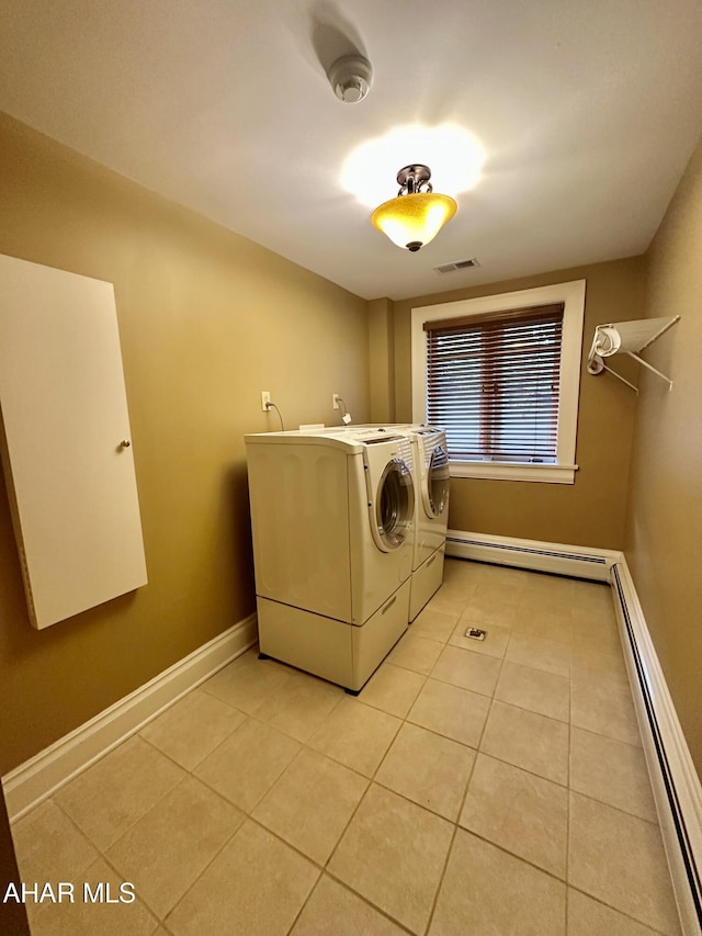 3405 Crescent Rd, Altoona, PA 16602 - laundry area with a baseboard heating unit, independent washer and dryer, and light tile patterned flooring