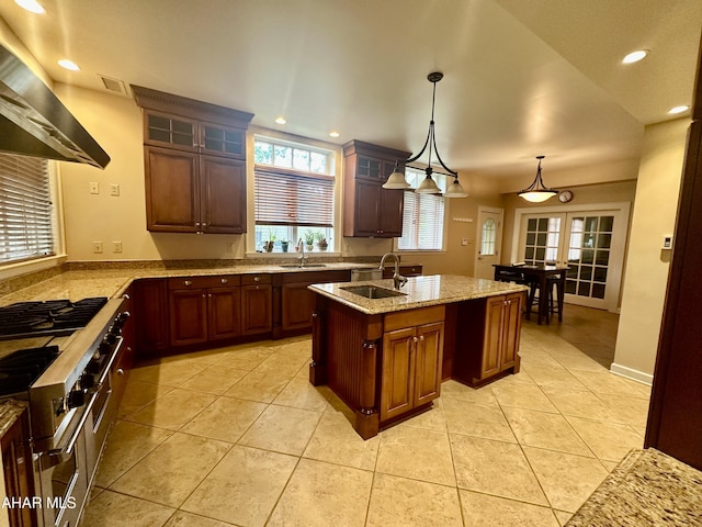 3405 Crescent Rd, Altoona, PA 16602 - kitchen featuring wall chimney exhaust hood, a sink, a center island with sink, recessed lighting, and light tile patterned floors