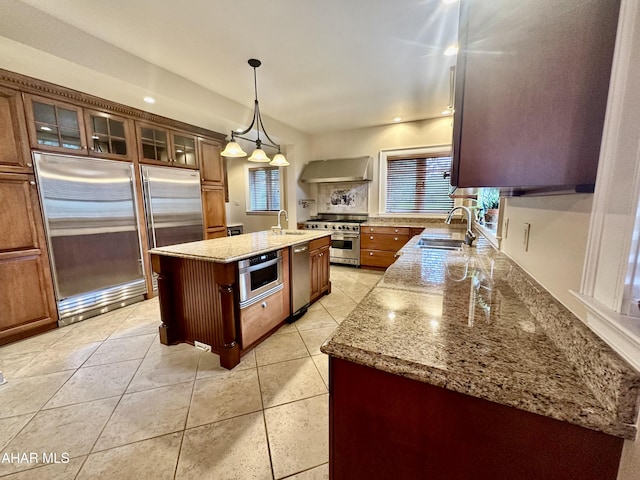 3405 Crescent Rd, Altoona, PA 16602 - kitchen with premium appliances, wall chimney exhaust hood, a sink, and a kitchen island with sink
