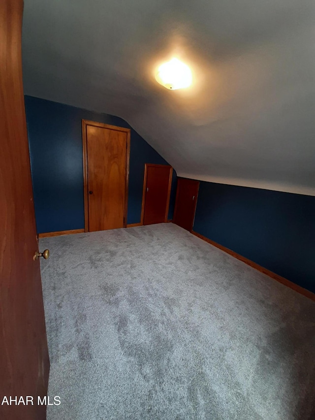 735 N Julian St, Ebensburg, PA 15931 - bonus room featuring lofted ceiling, carpet, and baseboards