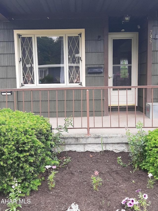 735 N Julian St, Ebensburg, PA 15931 - doorway to property featuring covered porch