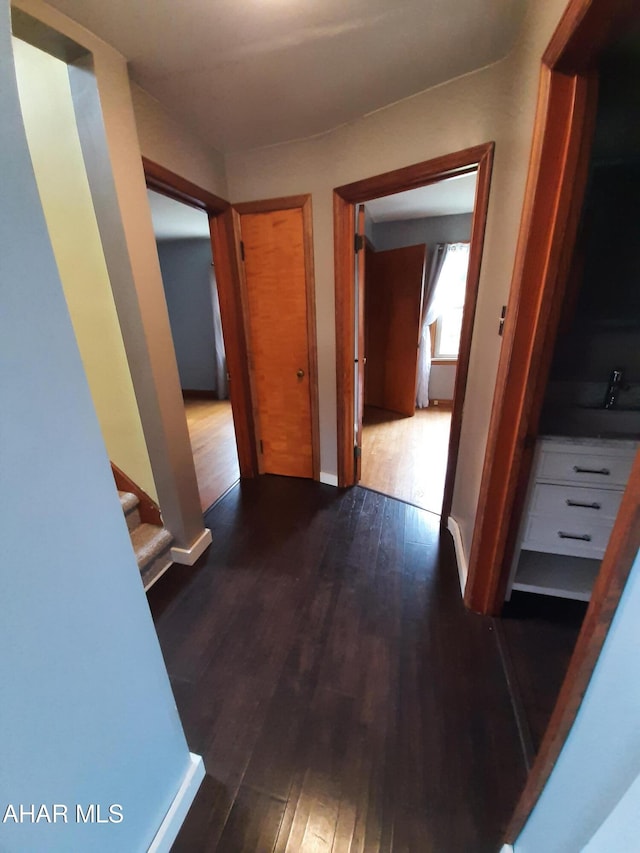 735 N Julian St, Ebensburg, PA 15931 - corridor with hardwood / wood-style floors, stairway, and baseboards