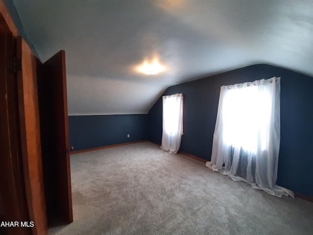 735 N Julian St, Ebensburg, PA 15931 - additional living space with lofted ceiling, carpet, and baseboards