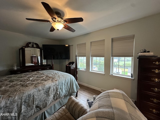 bedroom featuring ceiling fan and light wood-type flooring