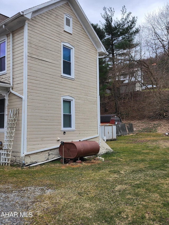 view of property exterior featuring a yard