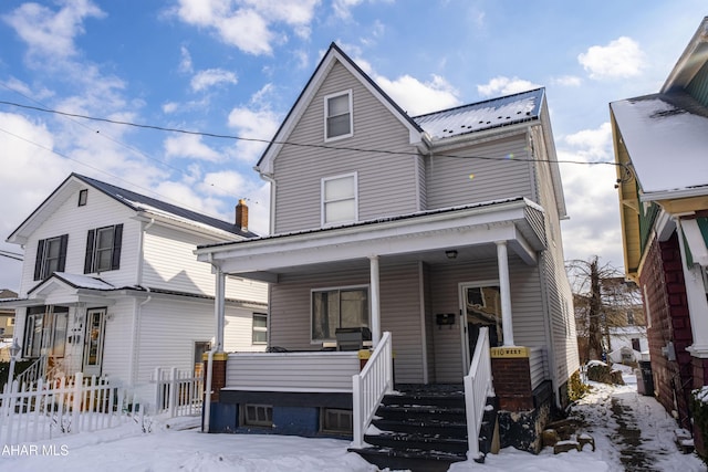 front of property featuring a porch