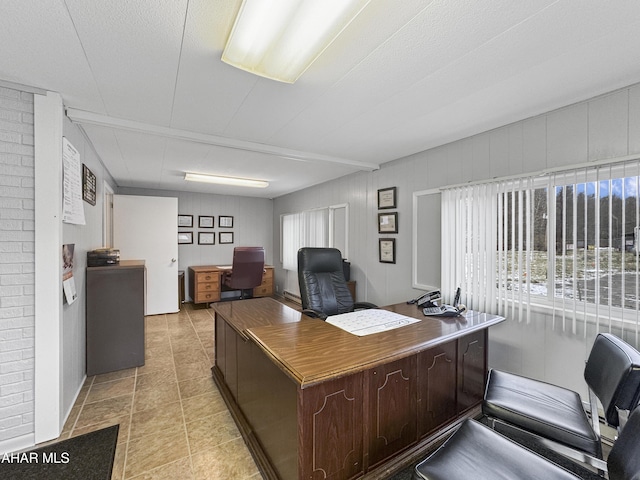 office space featuring a textured ceiling