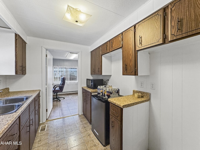 kitchen with sink and stainless steel range oven