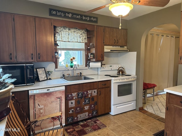 kitchen with white electric range, sink, decorative backsplash, and dishwashing machine