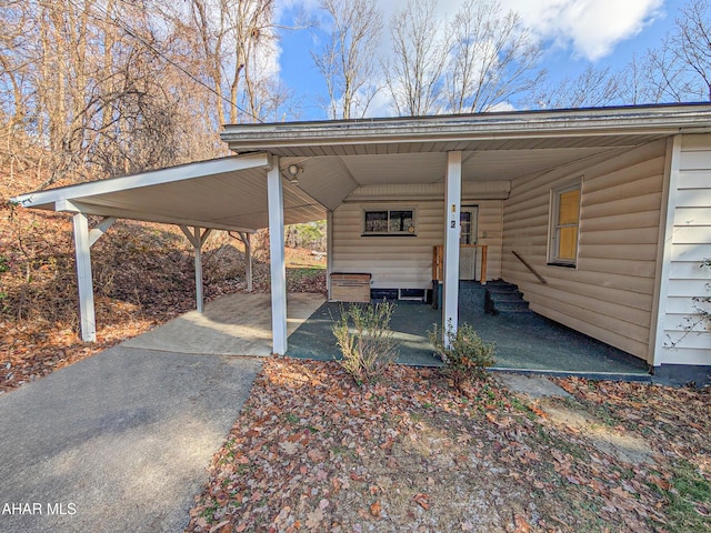 view of parking / parking lot with a carport