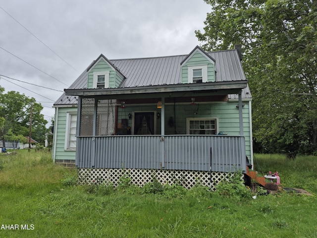 1429 Everett Rd, East Freedom, PA 16637 - view of front facade with covered porch and a metal roof