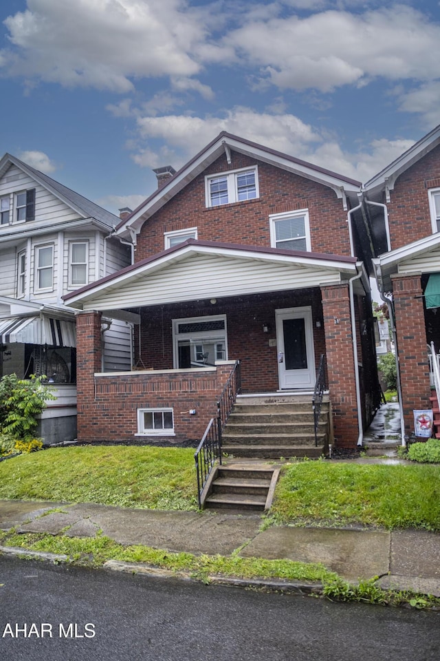 2822 5th Ave, Altoona, PA 16602 - view of front of property with covered porch and brick siding