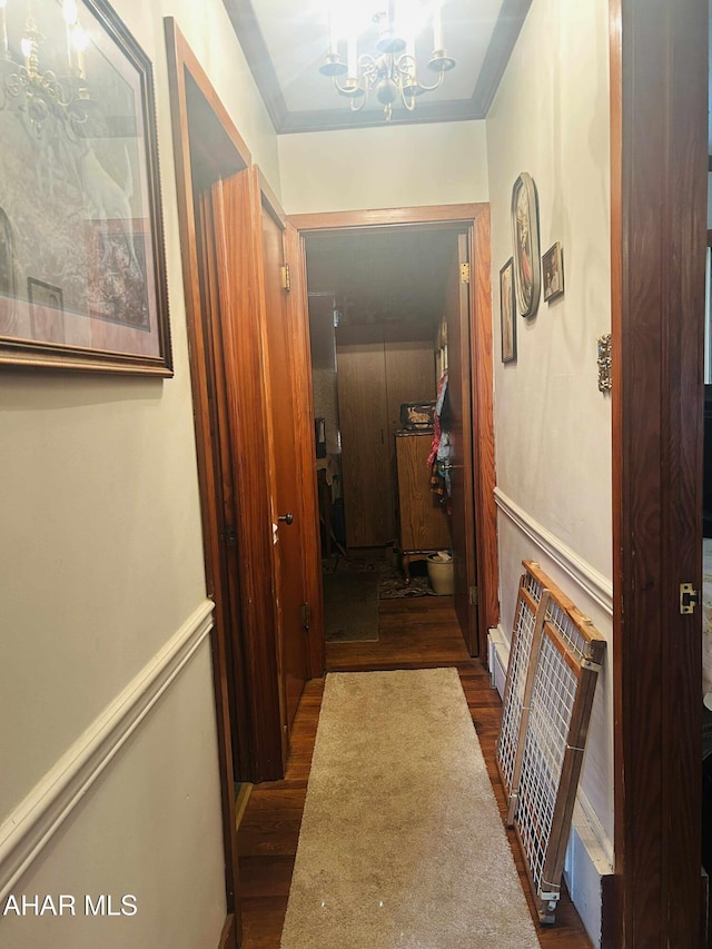 14 W 2nd St, Everett, PA 15537 - corridor with wood finished floors and a chandelier