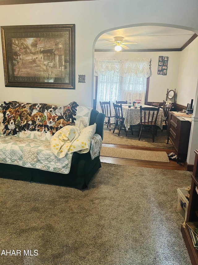 14 W 2nd St, Everett, PA 15537 - living area featuring arched walkways, a ceiling fan, and ornamental molding