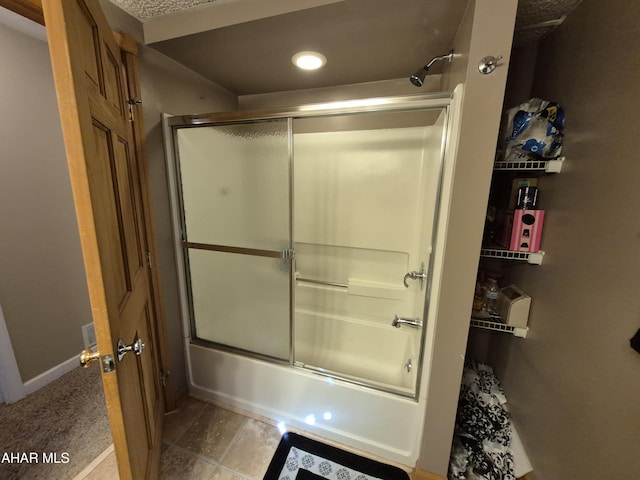 full bathroom with recessed lighting and enclosed tub / shower combo